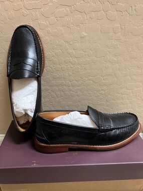 Johnston & Murphy Black Leather Penny Loafers with Brown Welt